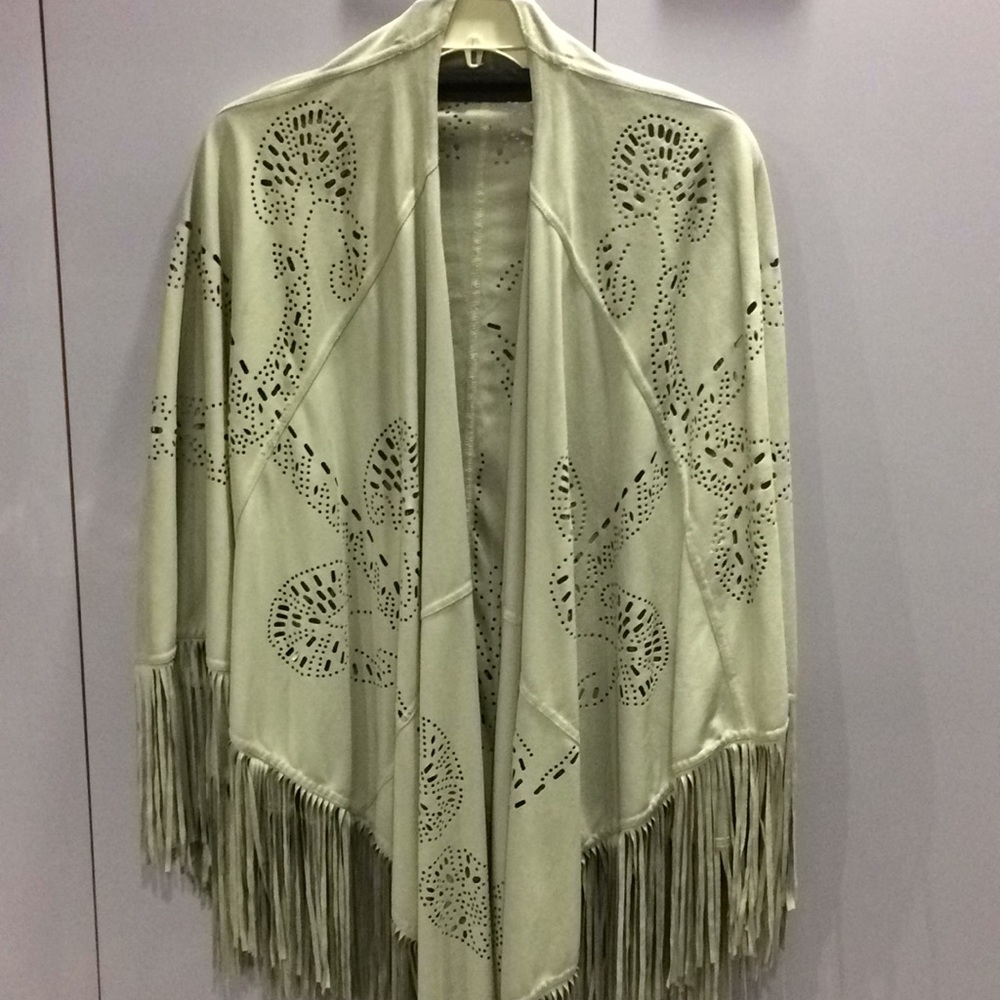 Insight NY Fringed cape poncho in natural.